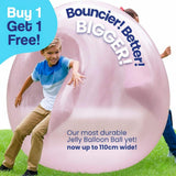 Kids playing with giant pink inflatable Jelly Balloon Ball outdoors, durable and large size